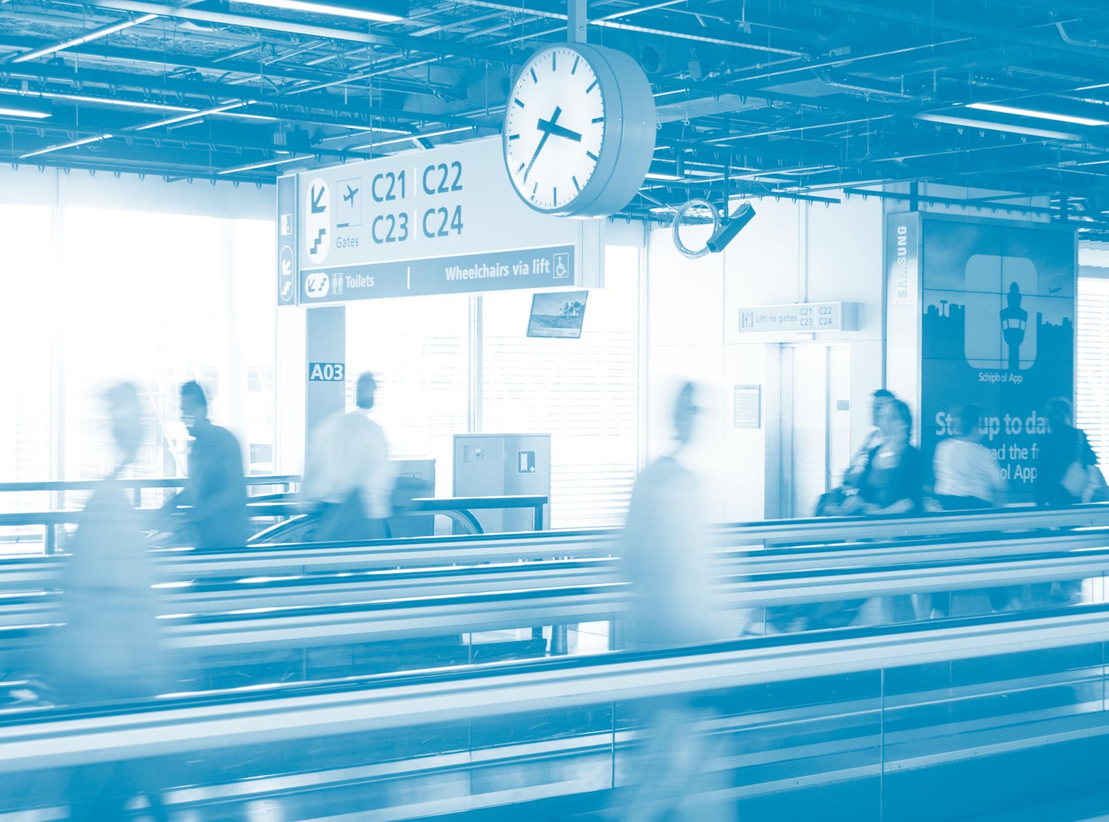 Large light blue duotone background photograph of people travelling across and flat ground escalator in an airport with a large clock at the top in the middle