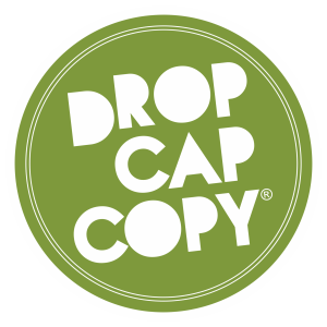 Logo 'DropCapCopy in a stencil font on a green circle badge background