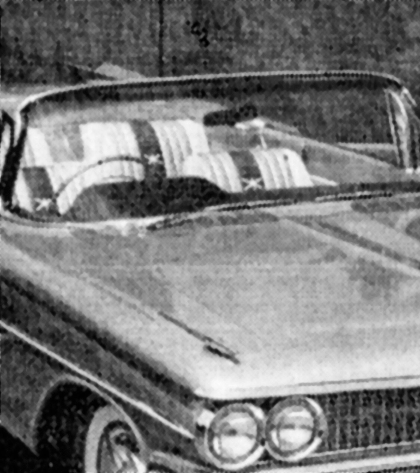Photograph of a car side-on showing halftone dots removed