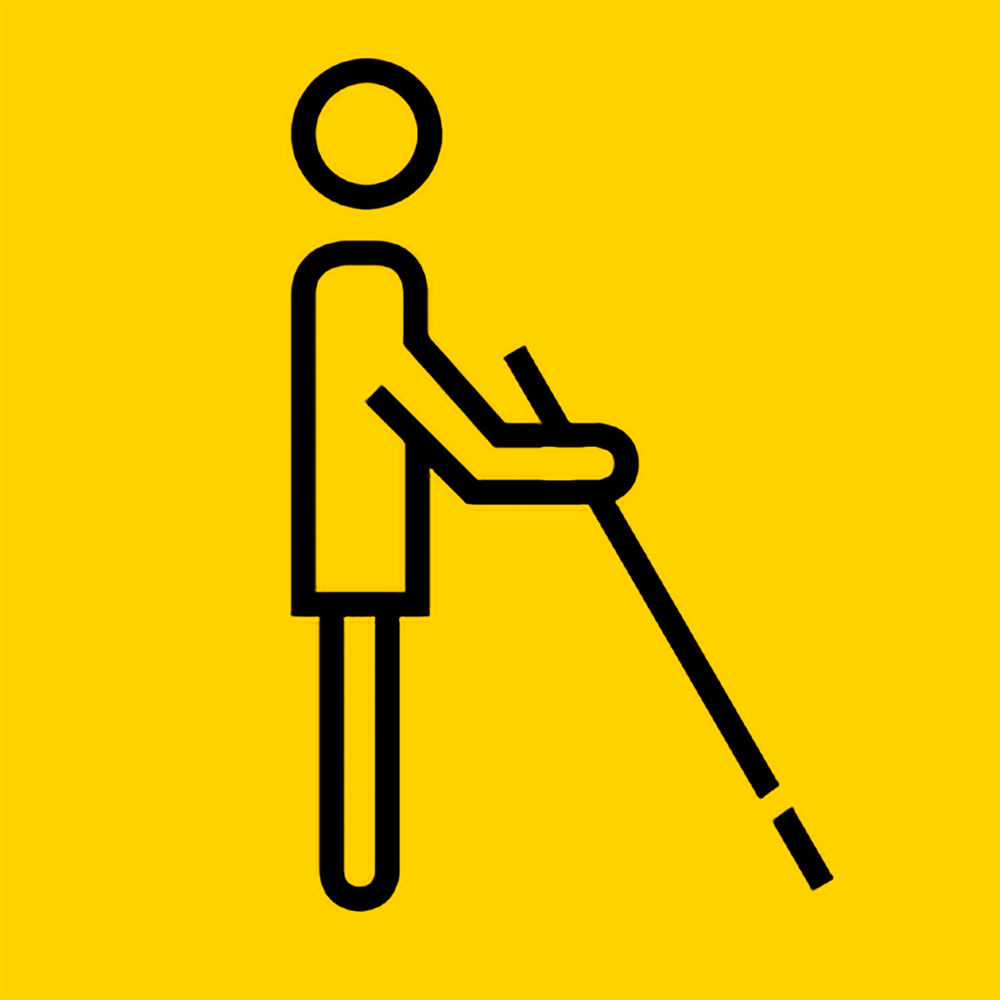 Yellow quare background, with a black line pictogram of person with vision impairments using a vision impairment stick to find their way forward